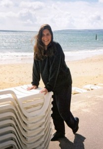 A photo Sheila took of Jae in labour leaning on plastic furniture on Bournemouth beach as a contraction has just passed
